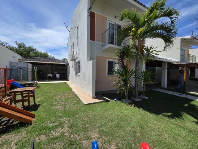 Casa / Sobrado em Condomínio para Venda em Lauro de Freitas/BA Buraquinho 5 Quartos
