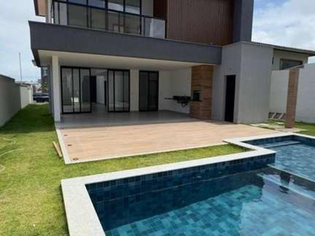 Casa / Sobrado em Condomínio para Venda em Lauro de Freitas/BA Buraquinho 4 Quartos