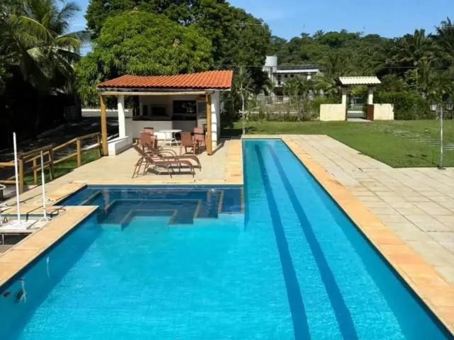 Casa / Sobrado em Condomínio para Venda em Lauro de Freitas/BA Portão 7 Quartos