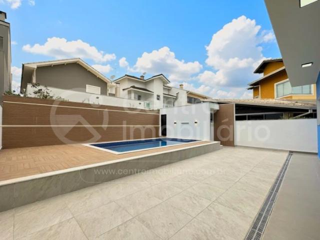 Casa / Sobrado em Condomínio para Venda em Peruíbe/SP Jardim Três Marias 4 Quartos