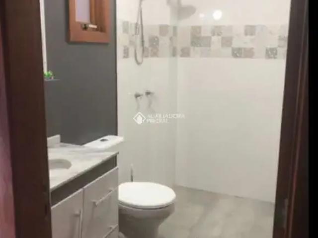 Casa / Sobrado em Condomínio para Venda em Porto Alegre/RS Guarujá 3 Quartos