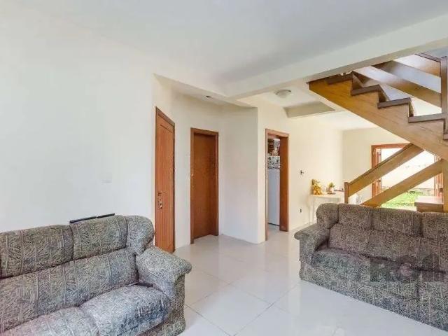 Casa / Sobrado em Condomínio para Venda em Porto Alegre/RS Guarujá 3 Quartos