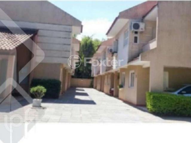 Casa / Sobrado em Condomínio para Venda em Porto Alegre/RS Guarujá 3 Quartos