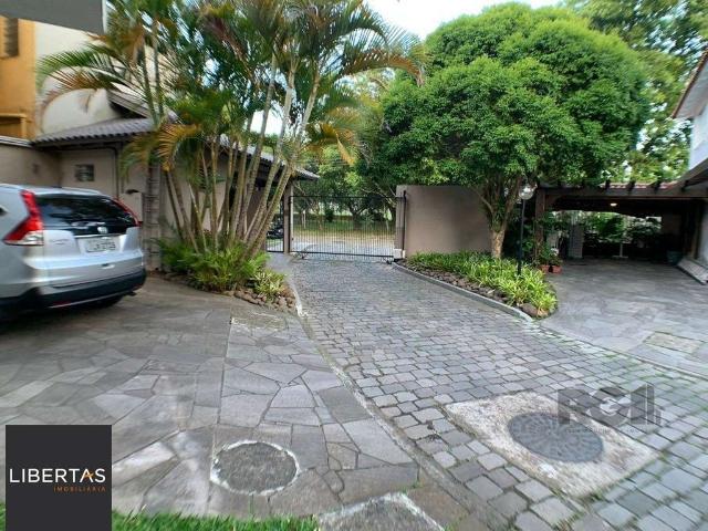 Casa / Sobrado em Condomínio para Venda em Porto Alegre/RS Jardim Isabel 3 Quartos