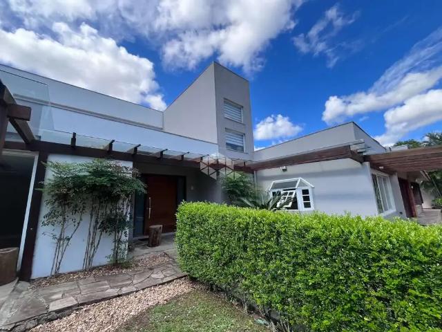 Casa / Sobrado em Condomínio para Venda em Porto Alegre/RS Pedra Redonda 5 Quartos