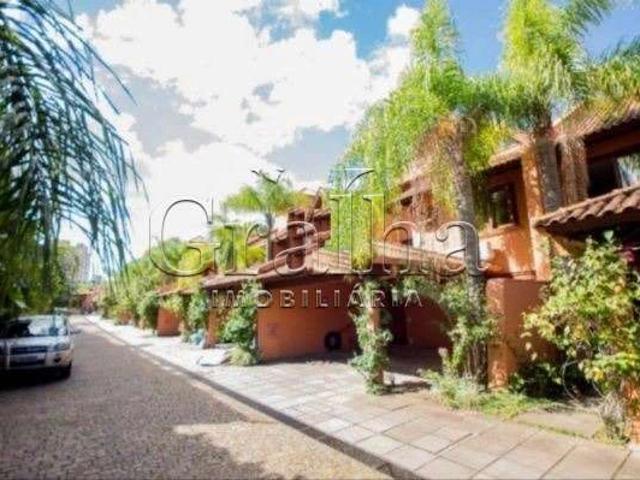 Casa / Sobrado em Condomínio para Venda em Porto Alegre/RS Três Figueiras 4 Quartos