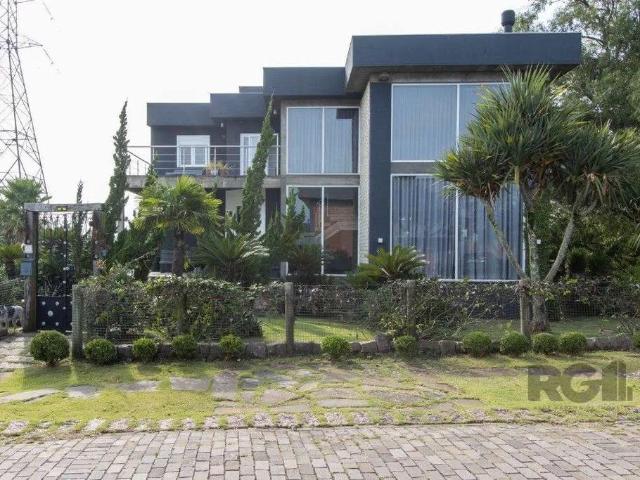 Casa / Sobrado em Condomínio para Venda em Porto Alegre/RS Vila Nova 4 Quartos