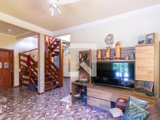 Casa / Sobrado em Condomínio para Venda em Porto Alegre/RS Vila Nova 3 Quartos