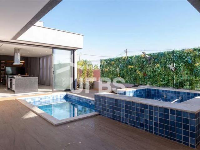 Casa / Sobrado em Condomínio para Venda em Senador Canedo/GO Jardins Nápoles 4 Quartos