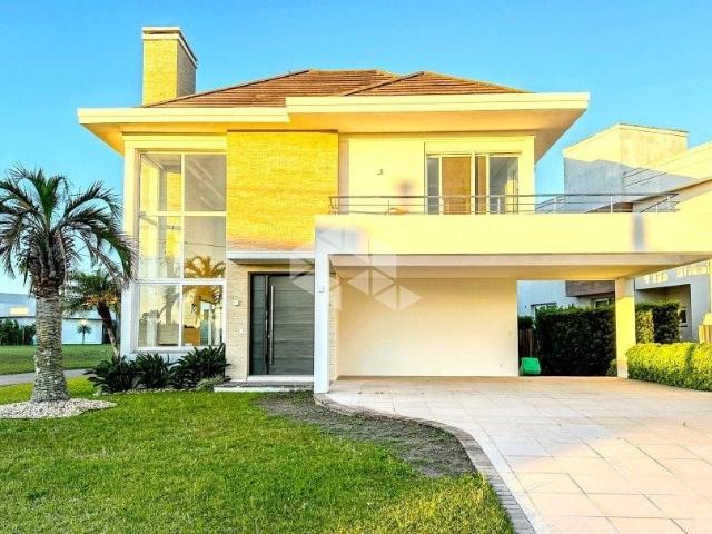 Casa / Sobrado em Condomínio para Venda em Torres/RS Itapeva 4 Quartos