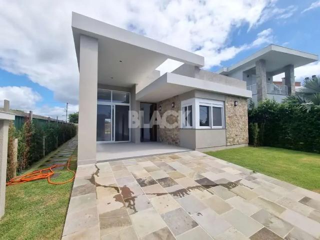 Casa / Sobrado em Condomínio para Venda em Torres/RS Pedra da Guarita 4 Quartos