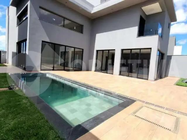 Casa / Sobrado em Condomínio para Venda em Uberlândia/MG Alphaville 4 Quartos
