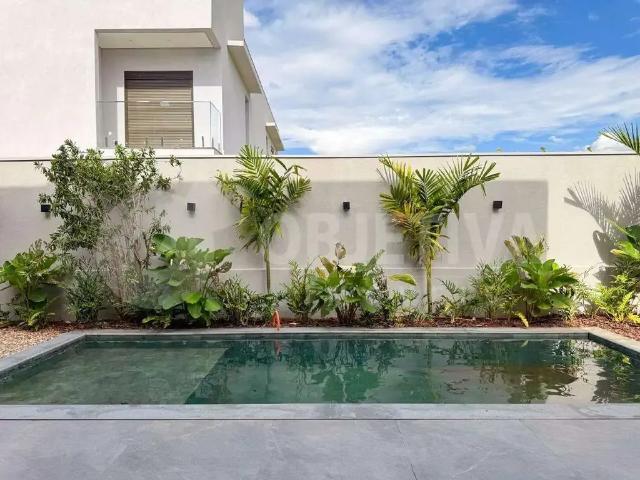 Casa / Sobrado em Condomínio para Venda em Uberlândia/MG Alphaville 4 Quartos