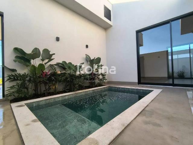 Casa / Sobrado em Condomínio para Venda em Uberlândia/MG Novo Mundo 3 Quartos