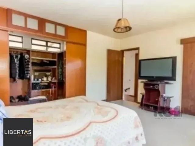 Casa sobrado no bairro Tristeza de 4 dormitórios 3 vagas PARA ALUGAR