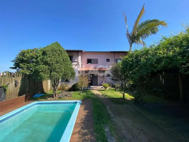 Casa / Sobrado para Venda em Torres/RS Stan 4 Quartos