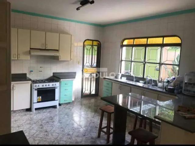 Casa / Sobrado para Venda em Uberlândia/MG Conjunto Segismundo Pereira 3 Quartos