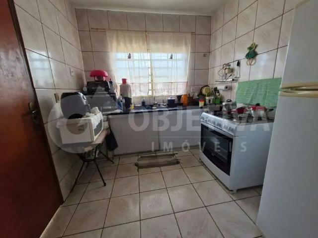 Casa / Sobrado para Venda em Uberlândia/MG Mansour 4 Quartos