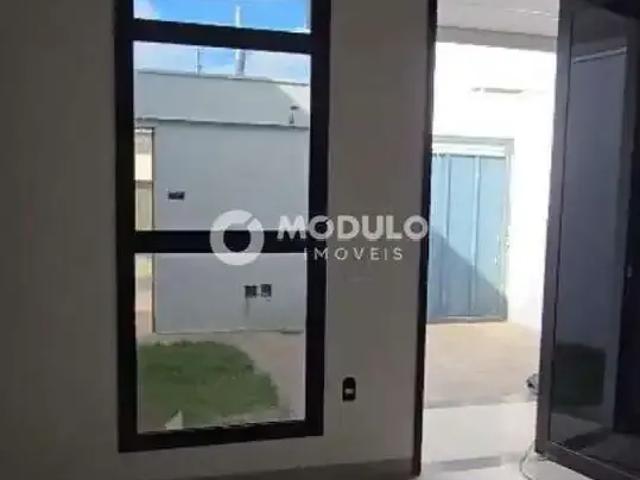 Casa / Sobrado para Venda em Uberlândia/MG Novo Mundo 3 Quartos