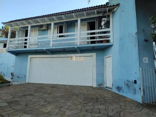 Casa / Sobrado para Venda em Viamão/RS Tarumã 4 Quartos