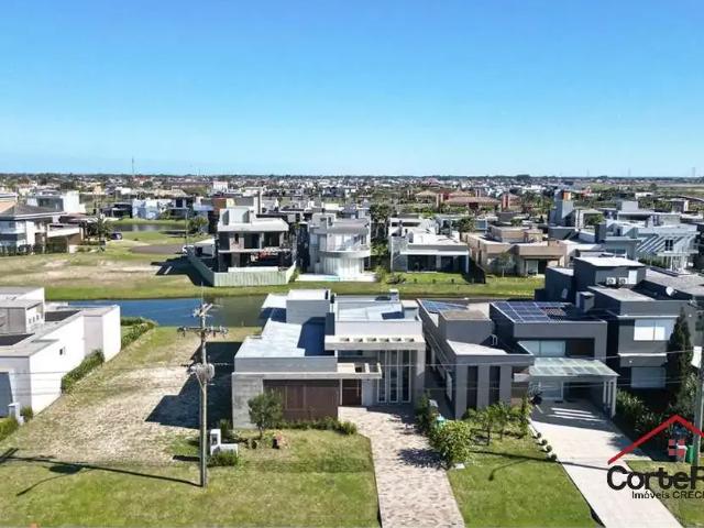 Casa / Sobrado para Venda em Xangri Lá/RS Centro 4 Quartos
