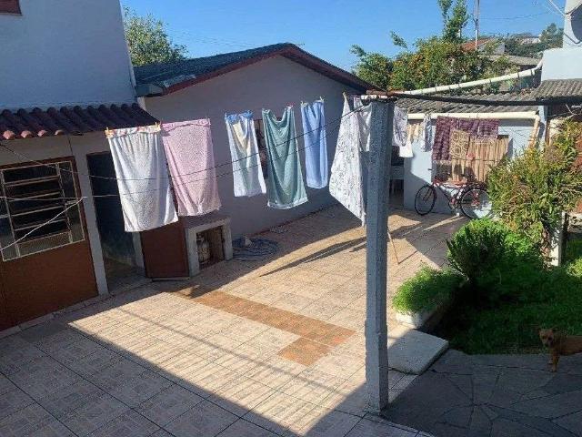 Casa / Sobrado para Venda em Alvorada/RS Maringá 4 Quartos