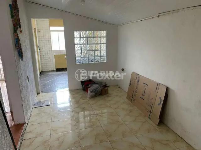 Casa / Sobrado para Venda em Alvorada/RS Aparecida 3 Quartos