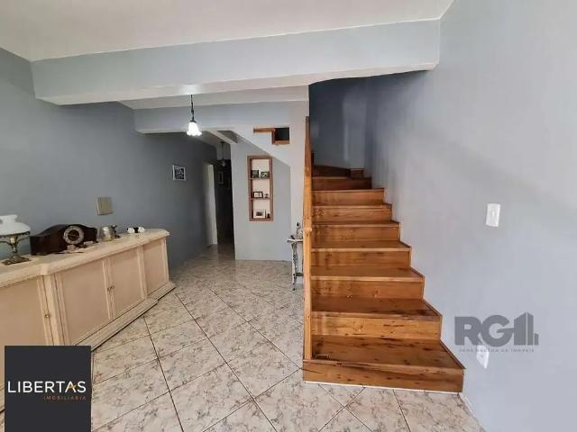 Casa / Sobrado para Venda em Alvorada/RS Jardim Algarve 3 Quartos