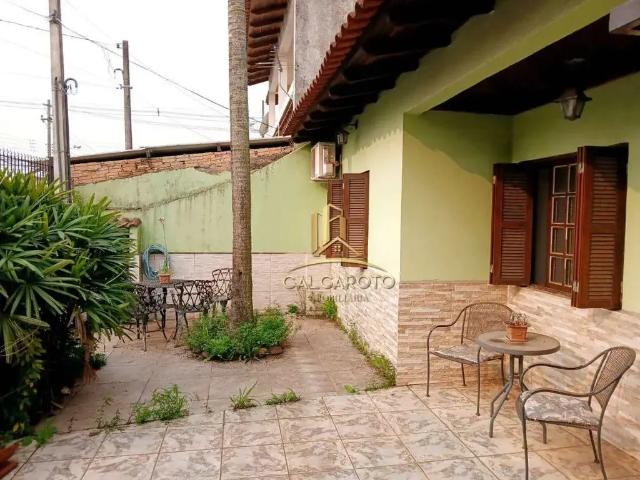 Casa / Sobrado para Venda em Alvorada/RS Jardim Algarve 3 Quartos