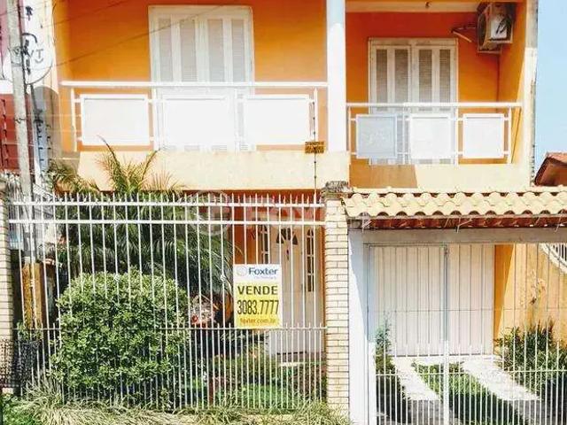 Casa / Sobrado para Venda em Alvorada/RS Jardim Algarve 3 Quartos