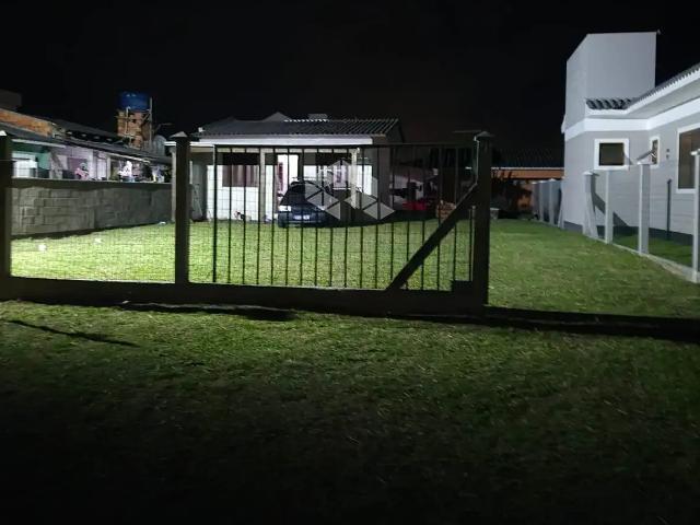 Casa / Sobrado para Venda em Arroio do Sal/RS Centro 2 Quartos
