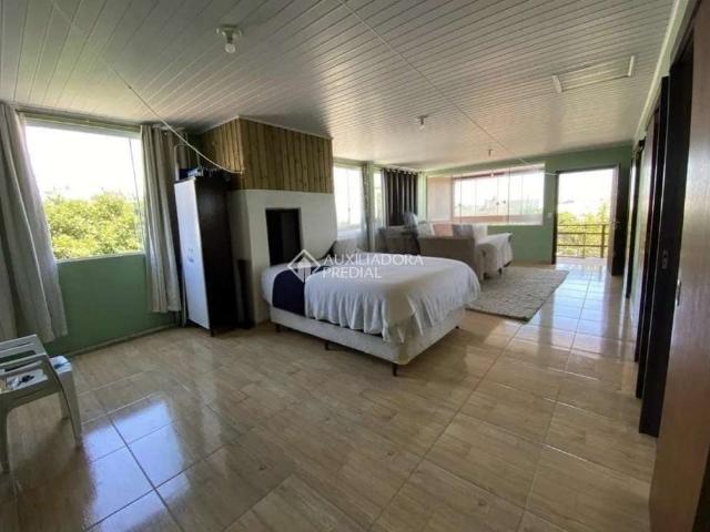 Casa / Sobrado para Venda em Arroio do Sal/RS Praia de Âncora 4 Quartos