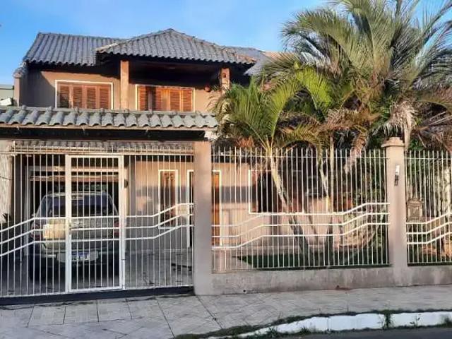 Casa / Sobrado para Venda em Canoas/RS Estância Velha 3 Quartos