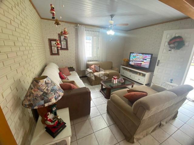 Casa / Sobrado para Venda em Capão da Canoa/RS Centro 4 Quartos
