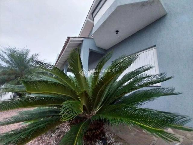 Casa / Sobrado para Venda em Capão da Canoa/RS Santo Antonio 4 Quartos
