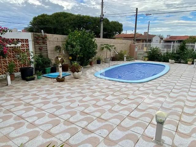 Casa / Sobrado para Venda em Capão da Canoa/RS Zona Nova 4 Quartos