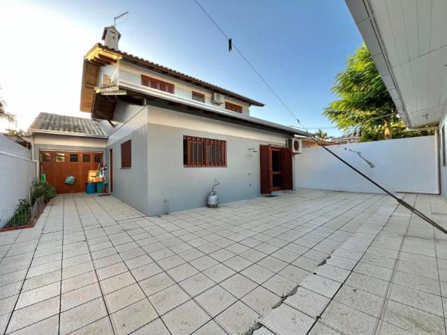 Casa / Sobrado para Venda em Capão da Canoa/RS Zona Nova 3 Quartos