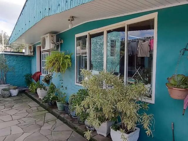 Casa / Sobrado para Venda em Esteio/RS Vila Olímpica 4 Quartos