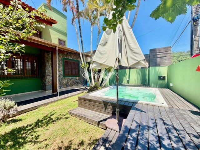 Casa / Sobrado para Venda em Florianópolis/SC Canasvieiras 4 Quartos