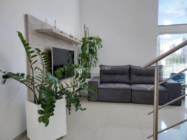 Casa / Sobrado para Venda em Florianópolis/SC Carianos 4 Quartos