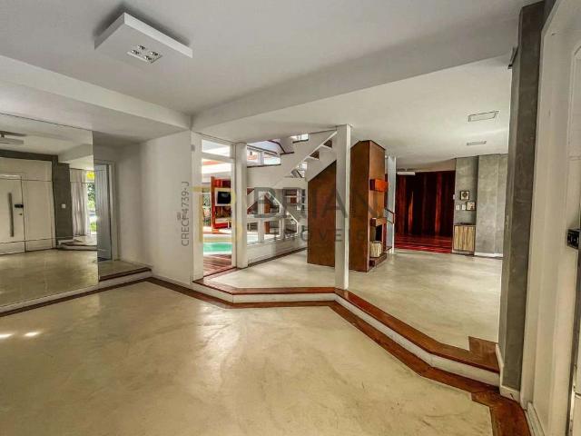 Casa / Sobrado para Venda em Florianópolis/SC Jurerê Internacional 5 Quartos