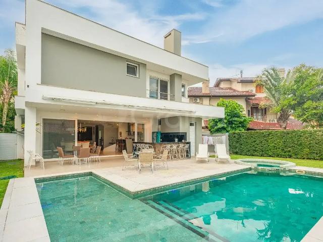 Casa / Sobrado para Venda em Florianópolis/SC Jurerê Internacional 5 Quartos