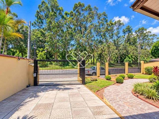 Casa / Sobrado para Venda em Gravataí/RS Bom Sucesso 4 Quartos