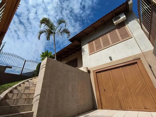 Casa / Sobrado para Venda em Gravataí/RS Dom Feliciano 3 Quartos