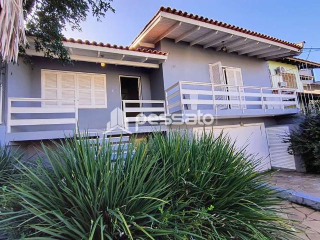Casa / Sobrado para Venda em Gravataí/RS Dom Feliciano 3 Quartos