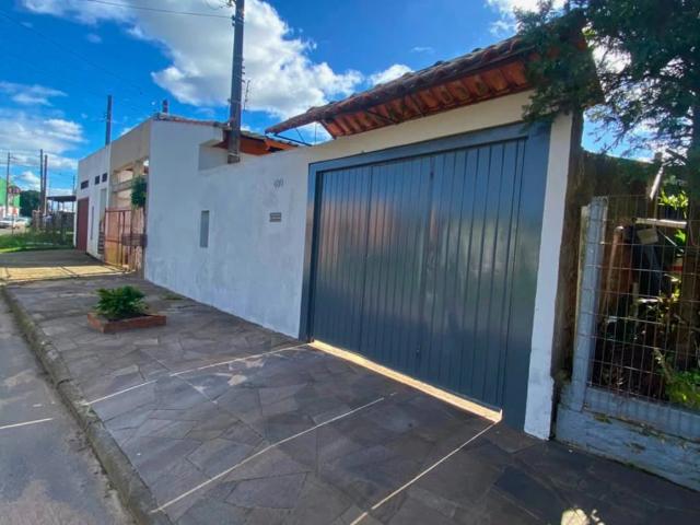 Casa / Sobrado para Venda em Gravataí/RS Sagrada Família 3 Quartos