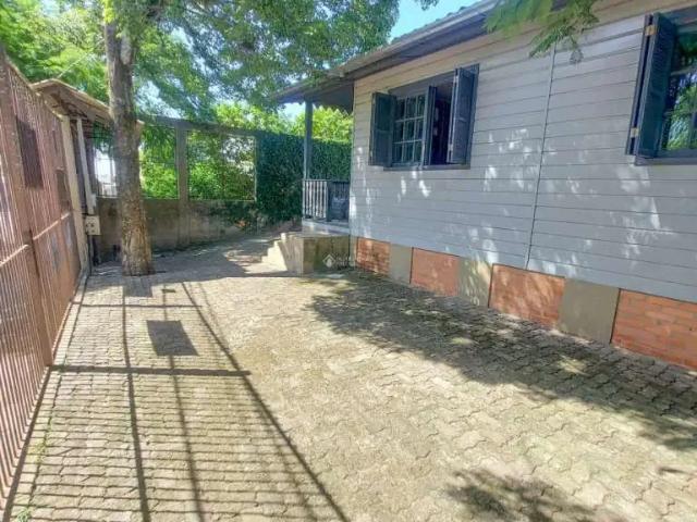 Casa / Sobrado para Venda em Guaíba/RS Columbia City 4 Quartos