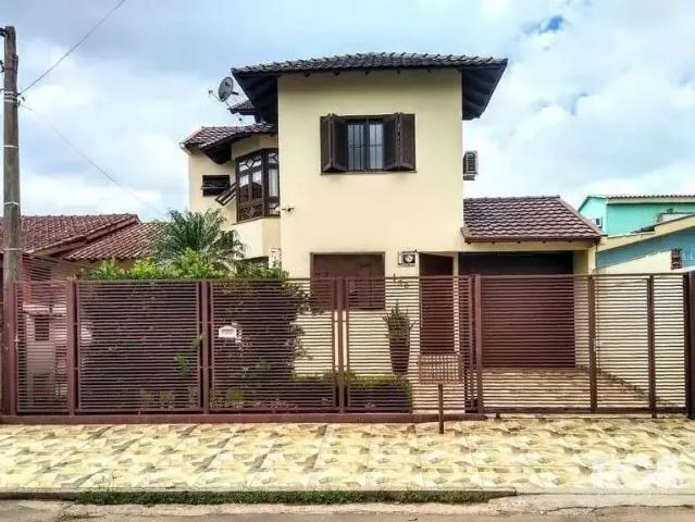 Casa / Sobrado para Venda em Guaíba/RS Nossa Sra. De Fátima 3 Quartos