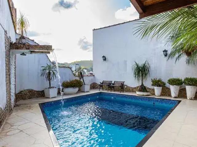 Casa / Sobrado para Venda em Juiz de Fora/MG Passos 4 Quartos