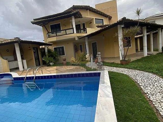Casa / Sobrado para Venda em Lauro de Freitas/BA Buraquinho 4 Quartos
